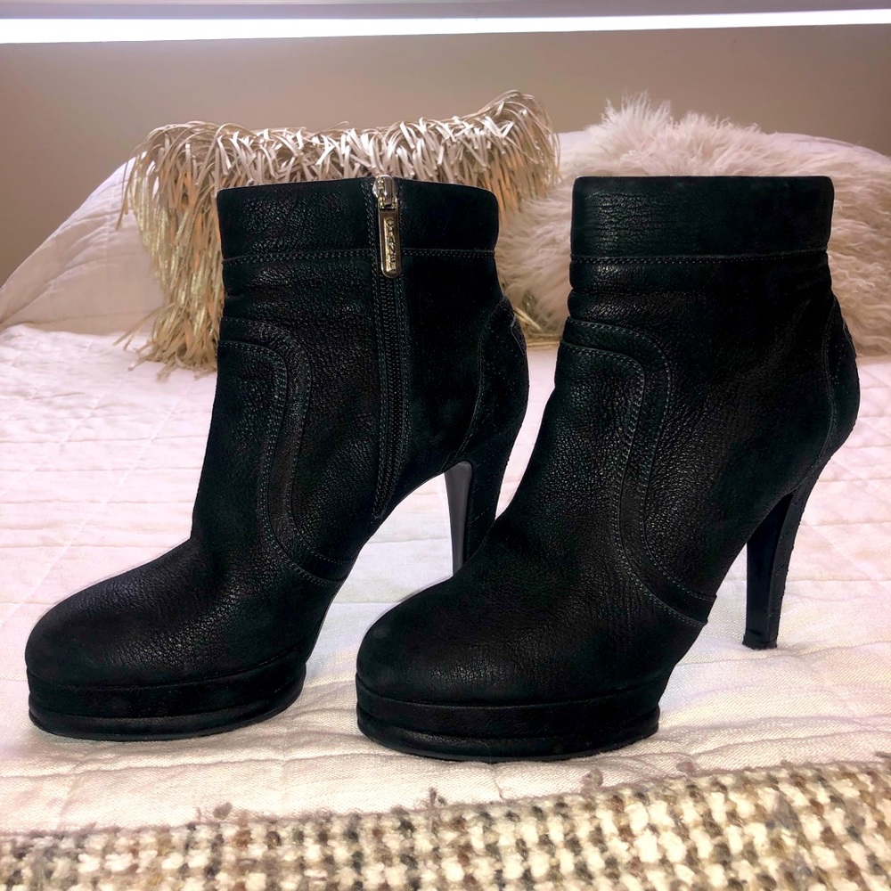 Chanel black ankle boots. No damage. Great soles.